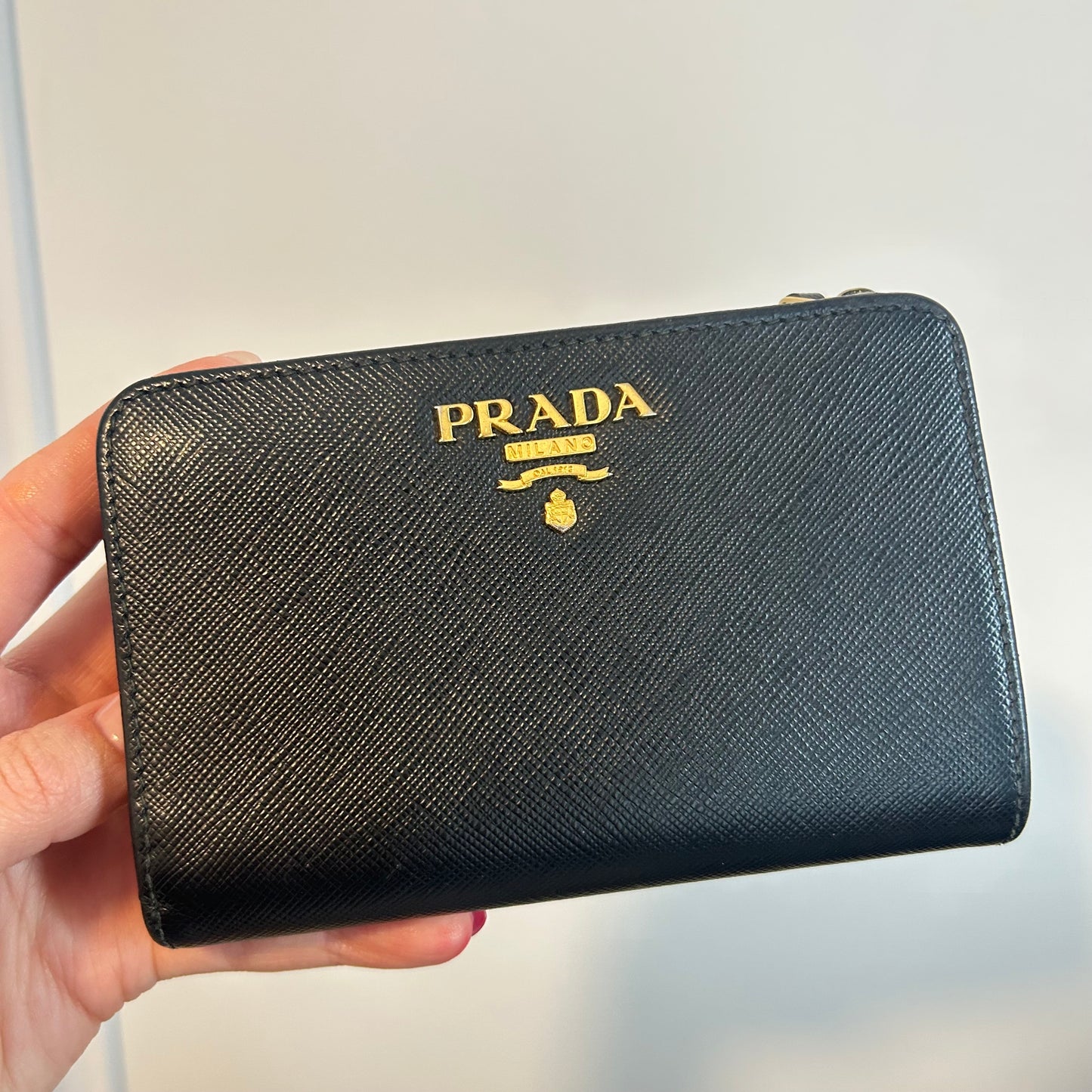 (2015) PRADA portefeuille compact en cuir saffiano